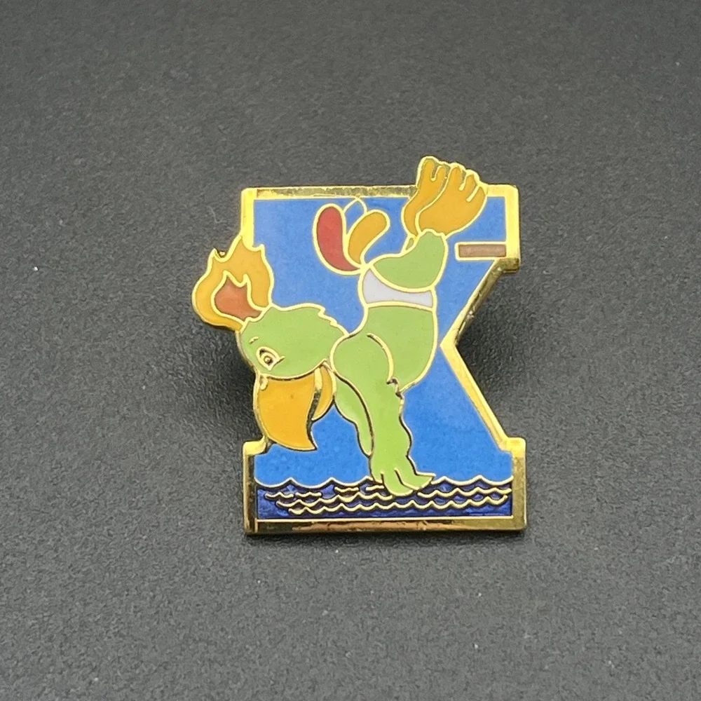 1987 Tenth Pan American Games Marsh Amigo‎ Mascot Diving Lapel Hat Pin